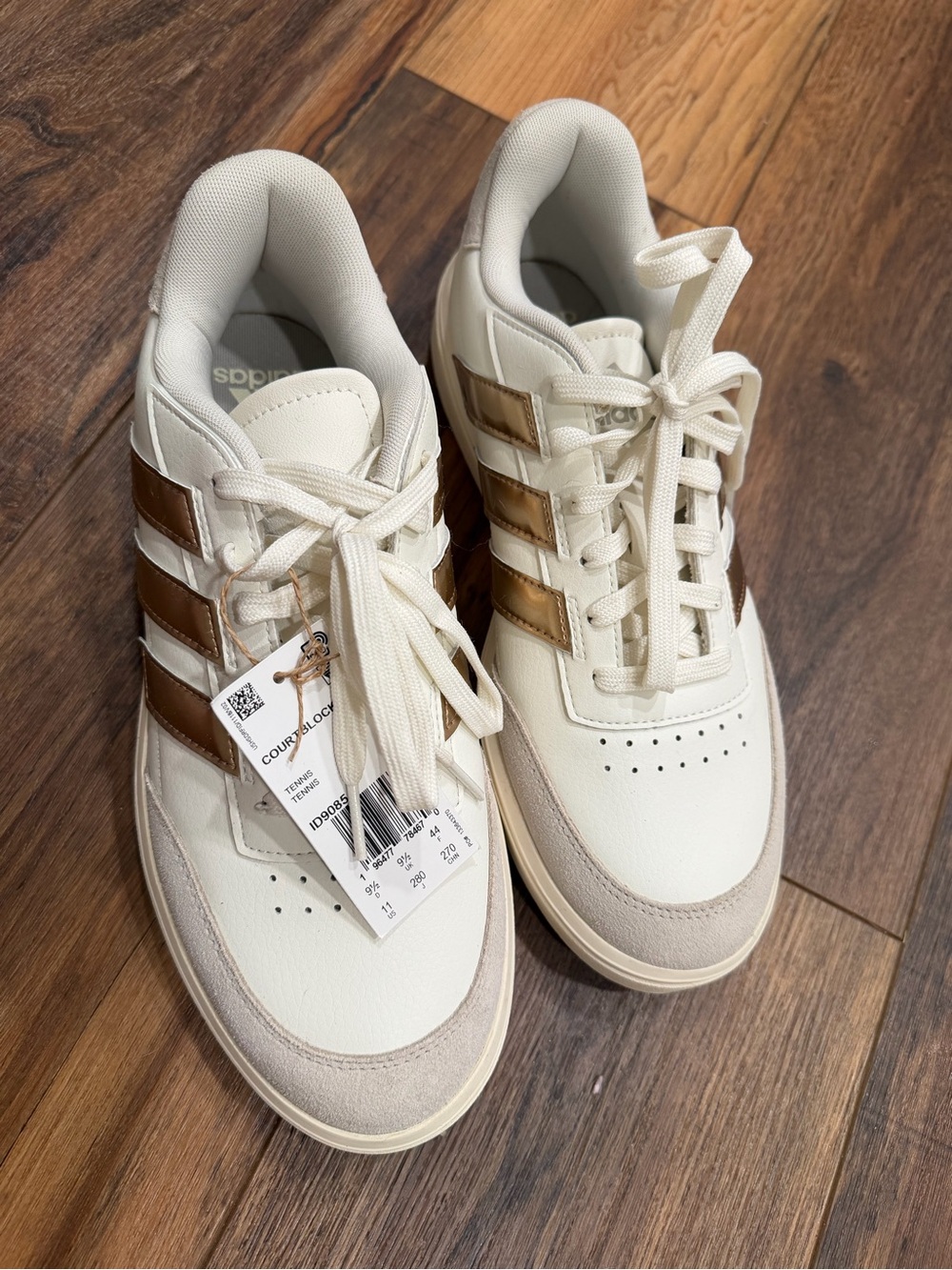 adidas Women’s White Sneakers with Metallic Gold Stripes